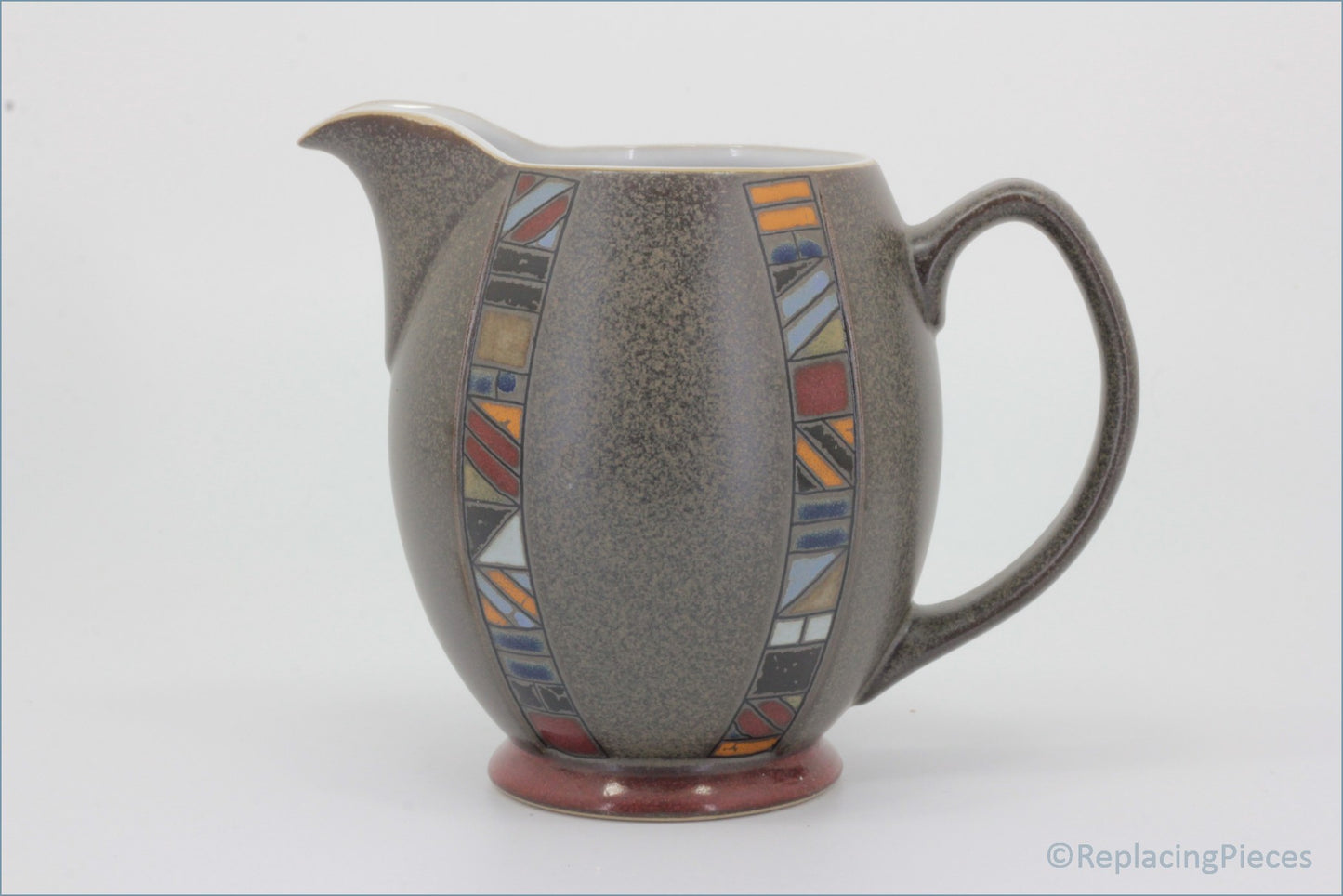 Denby - Marrakesh - 1 Pint Jug - Ceramic pitcher with geometric pattern on a white background