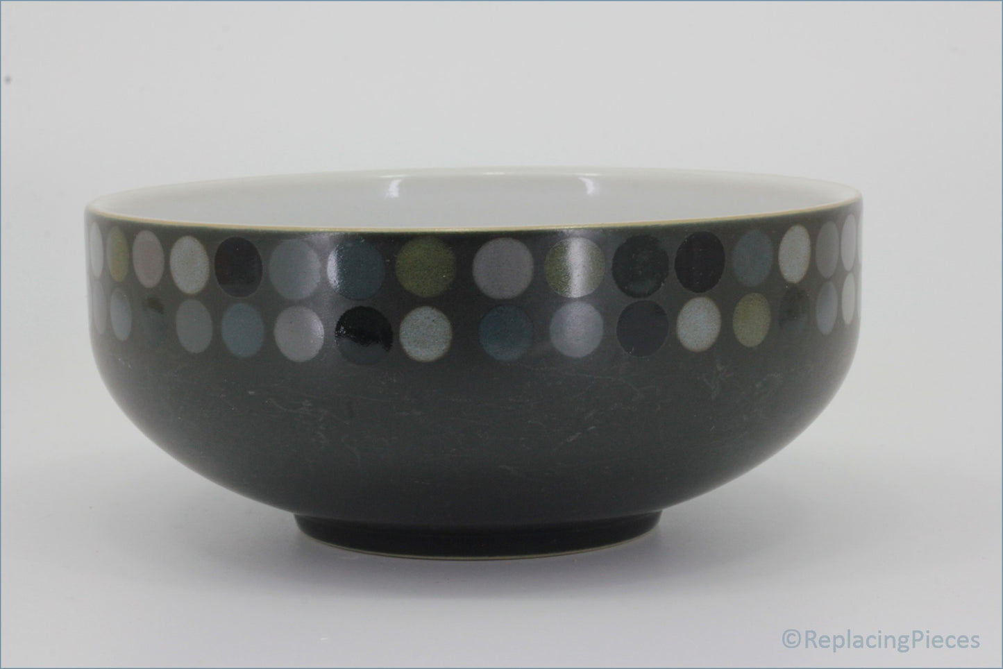 Denby - Jet - Cereal Bowl (Dots) - Black ceramic bowl with white polka dots on a white background