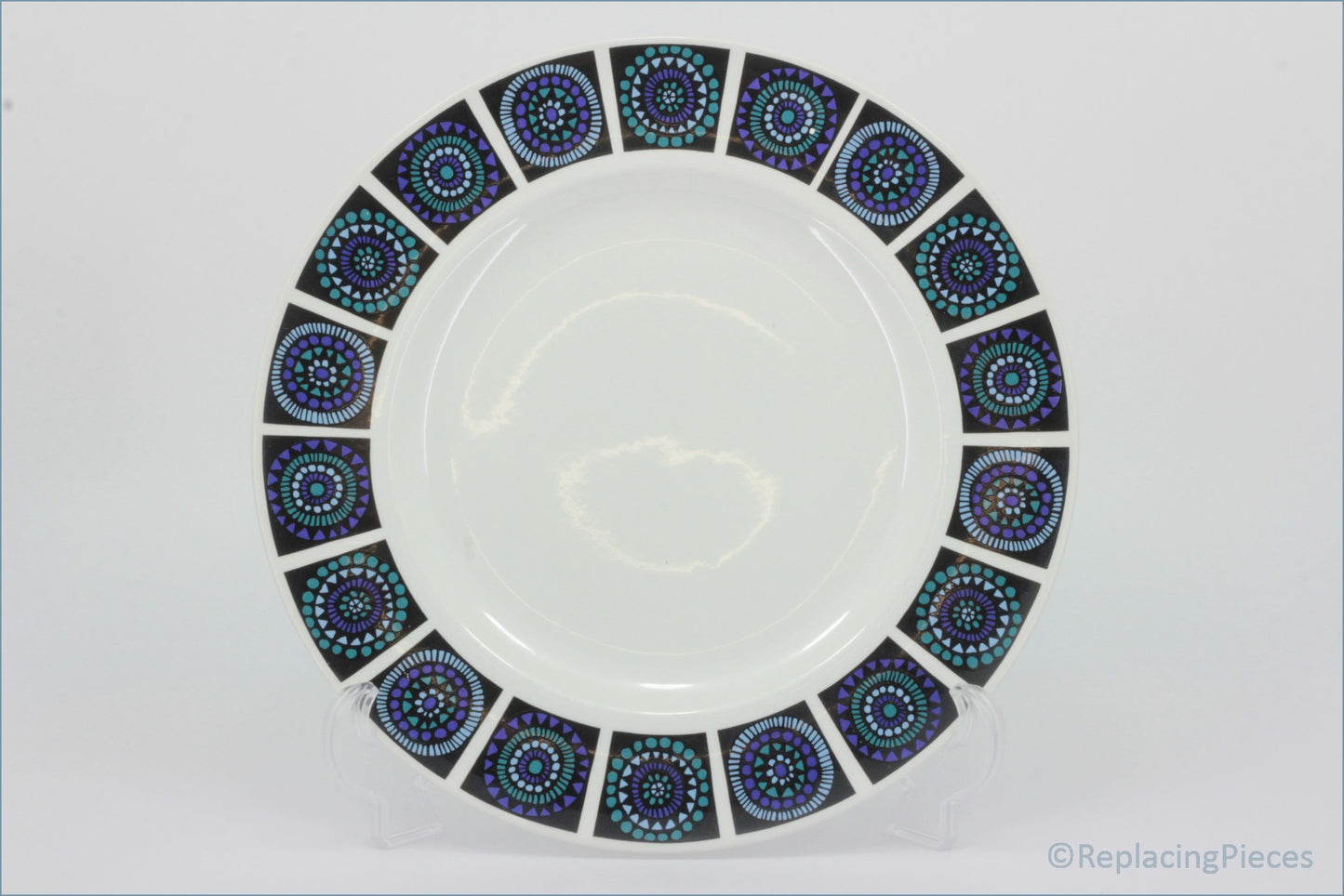Midwinter - Madeira - Dinner Plate - White plate with decorative purple and blue circular patterns on a white background