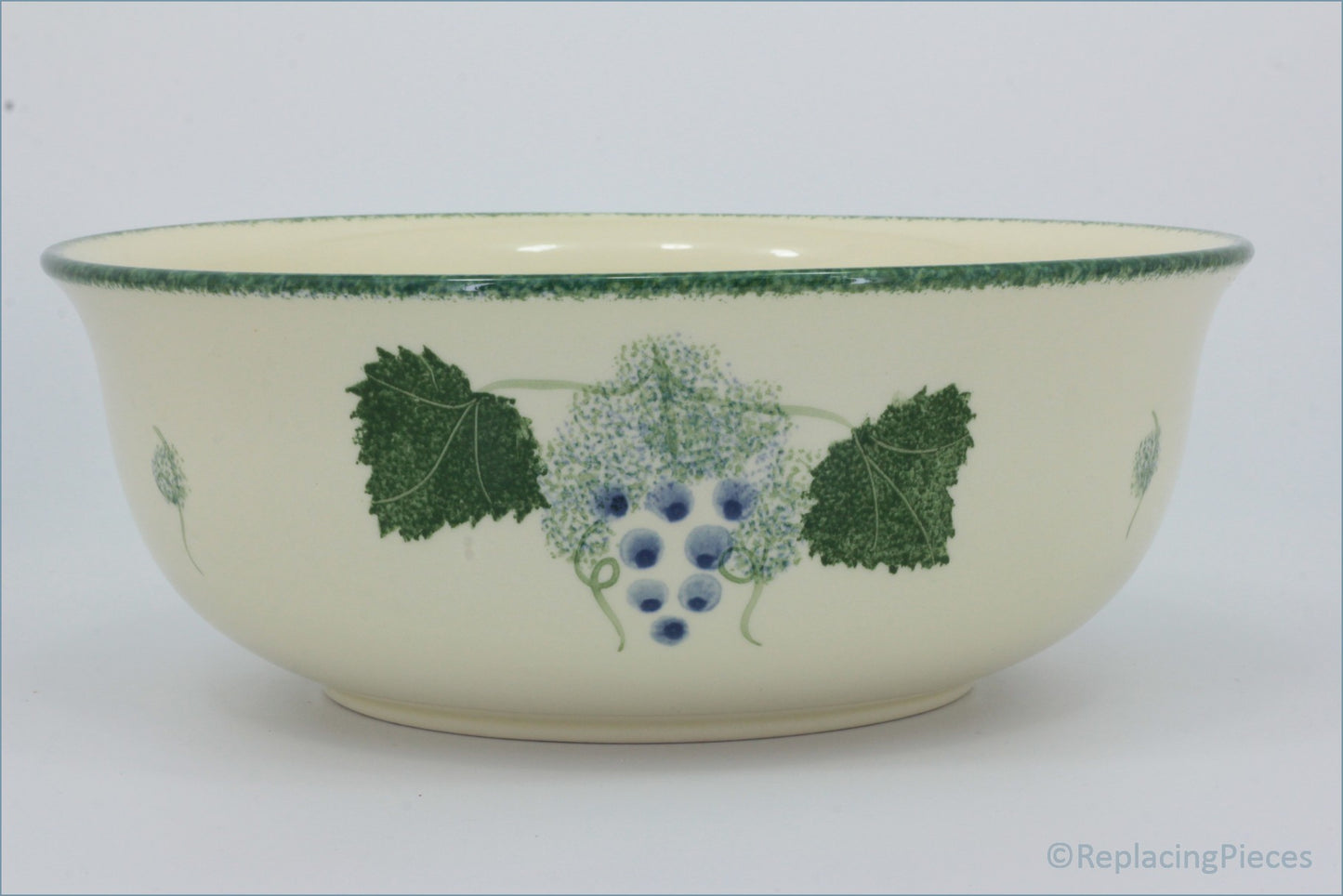 Poole - Vineyard - 9 3/4" Salad Bowl - Ceramic bowl with grape design on a cream background
