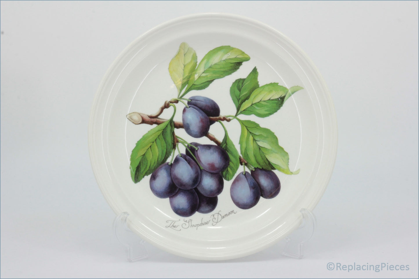 Decorative plate with a design of plums and leaves on a white background - Portmeirion - Pomona - Dinner Plate (The Shropshire Damson)