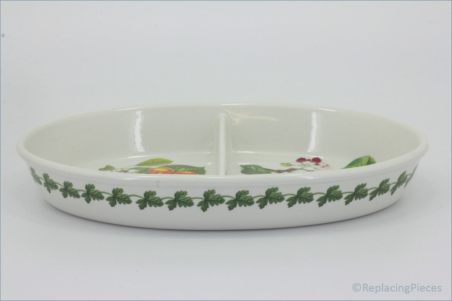 Portmeirion - Pomona - Oval Divided RoasterWhite ceramic platter with floral patterns on a white background-