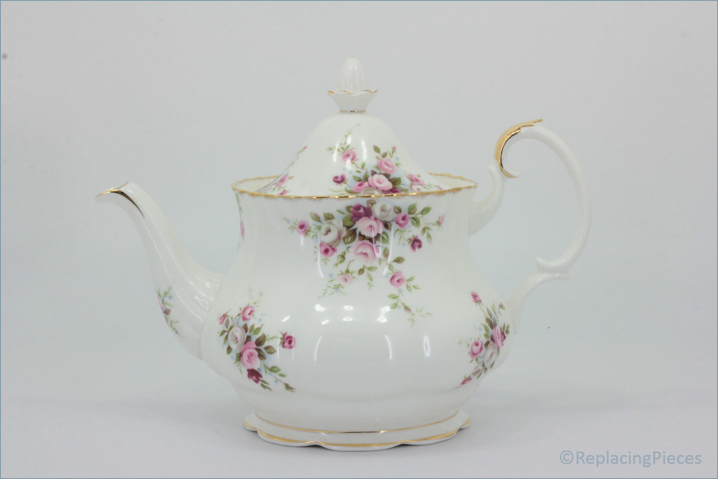 Royal Albert - Cottage Garden - Teapot - White teapot with floral design on a light gray background