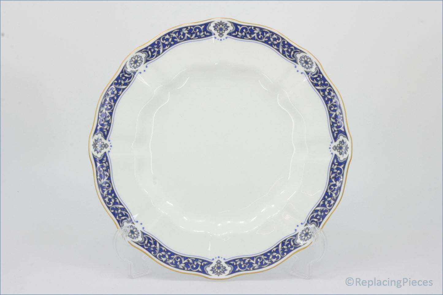 Royal Crown Derby - Milldale (A1326) - Dinner Plate - White plate with blue floral rim on a white background