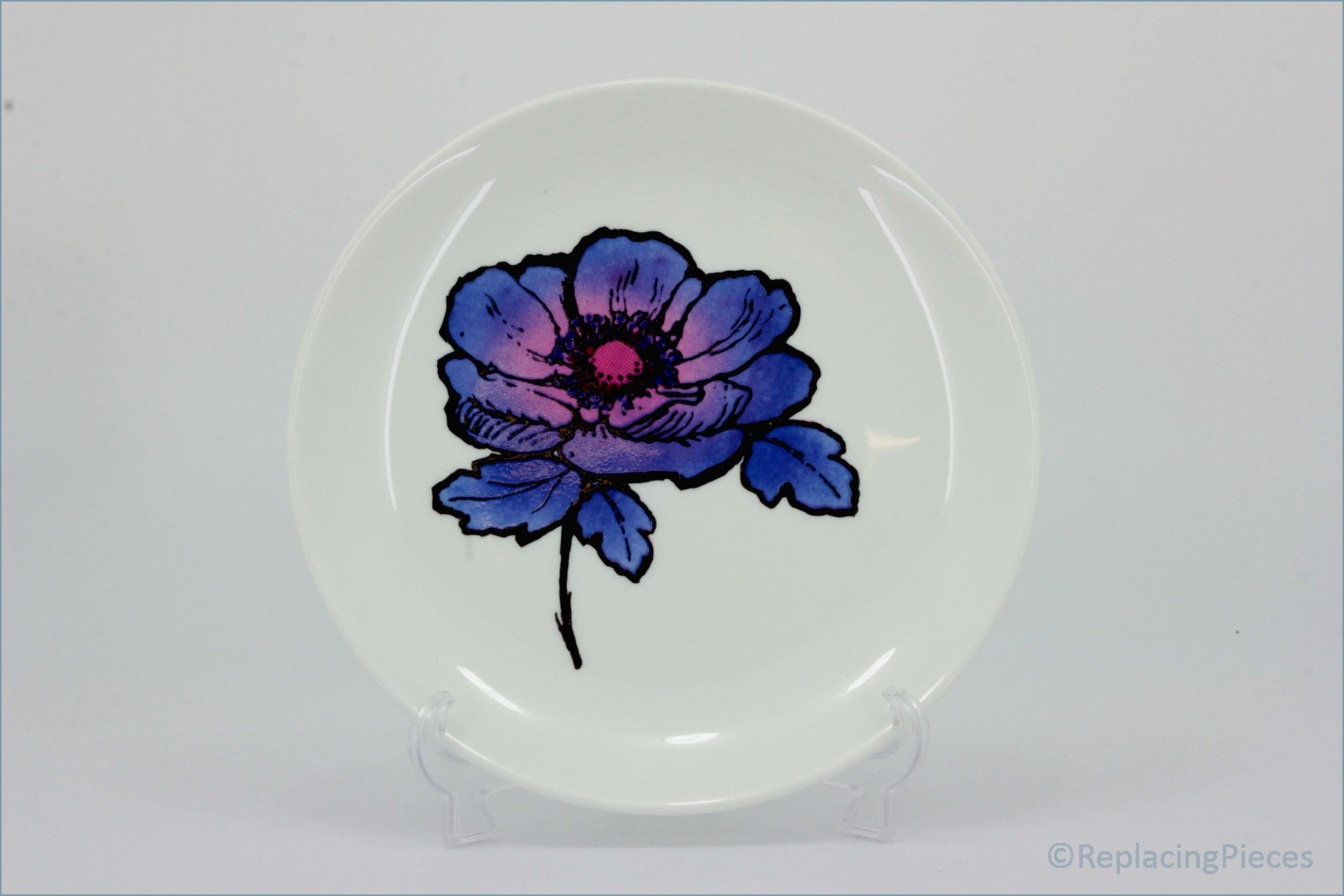 Wedgwood - Blue Anemone - 6 3/4" Side Plate - White plate with a purple flower design on a white background