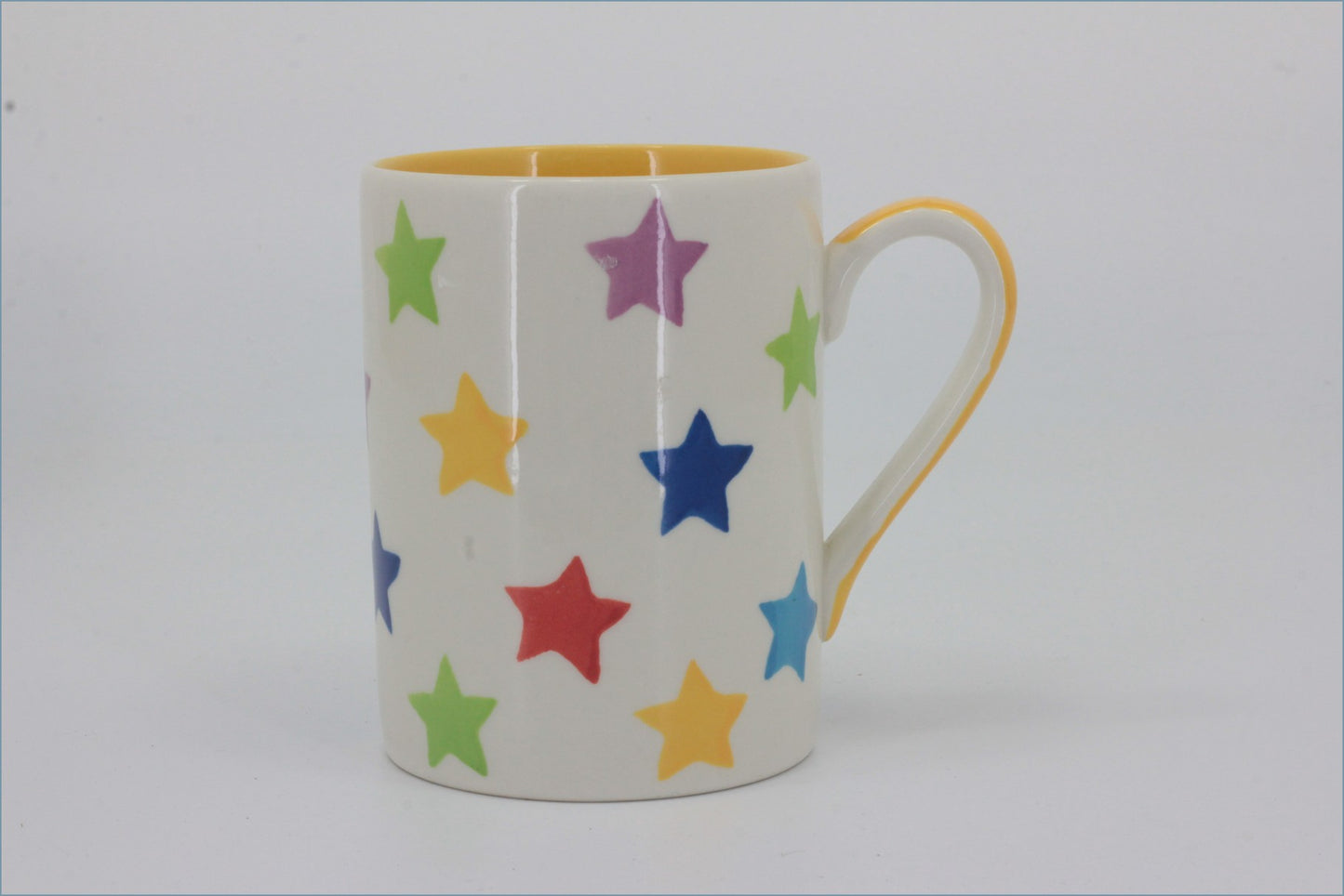 RPW288 - Whittards - Mug (Multi Coloured Stars - Yellow Interior)