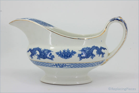 Booths - Blue Dragon - Gravy Boat - White ceramic gravy boat with blue floral and dragon design on a white background