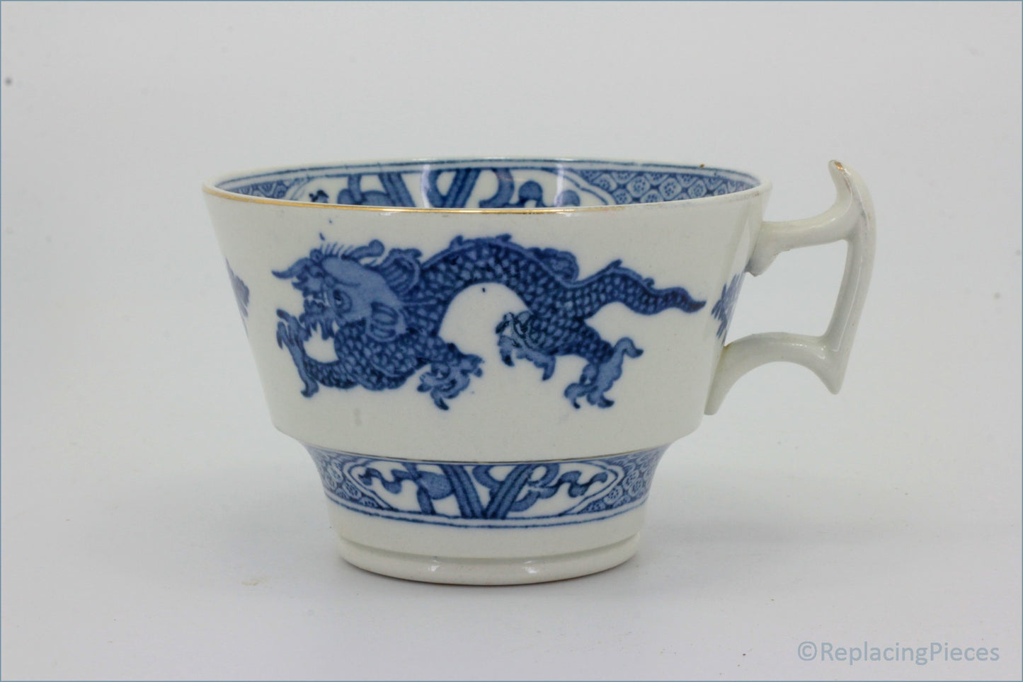 Booths - Blue Dragon - Teacup - White ceramic cup with blue dragon design on a white background