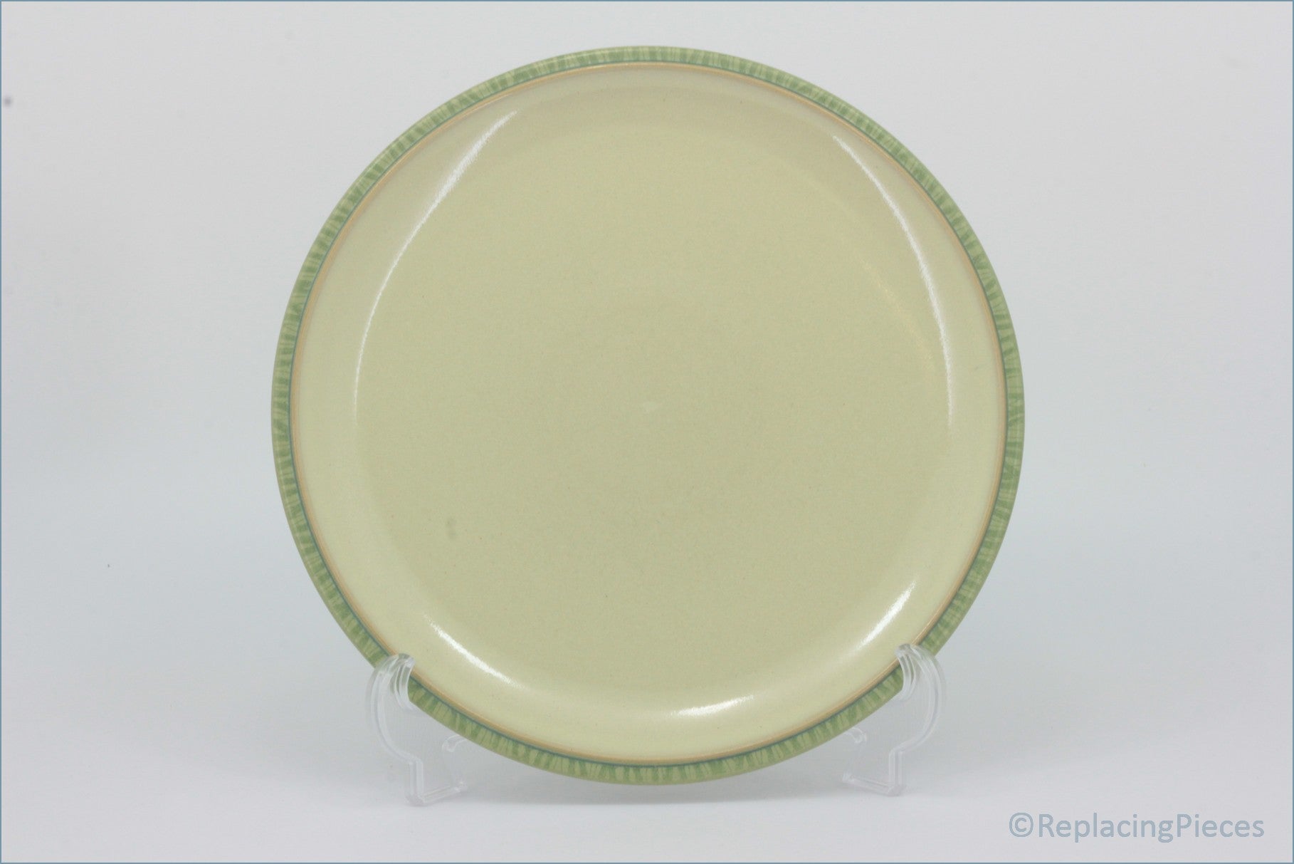 Denby - Calm - Dinner Plate (Light Green) - Beige plate with a green rim on a white background