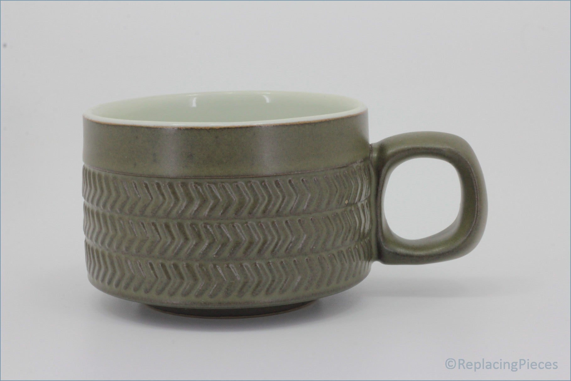 Denby - Chevron - Coffee Cup - Green ceramic mug with textured design on a white background