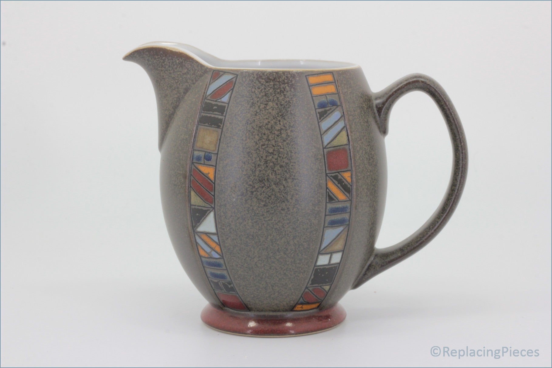 Denby - Marrakesh - 1 Pint Jug - Ceramic pitcher with geometric pattern on a white background