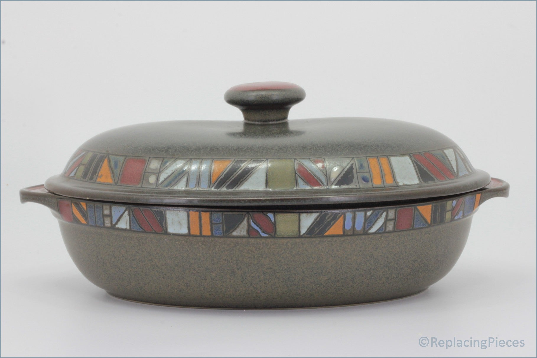 Denby - Marrakesh - Oval Casserole Dish - Gray ceramic casserole dish with a colorful geometric pattern on the lid against a white background