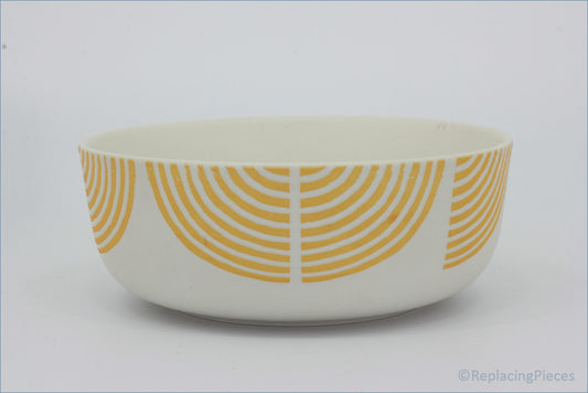 Habitat - Block Print - Cereal Bowl - White bowl with orange circular pattern on a white background