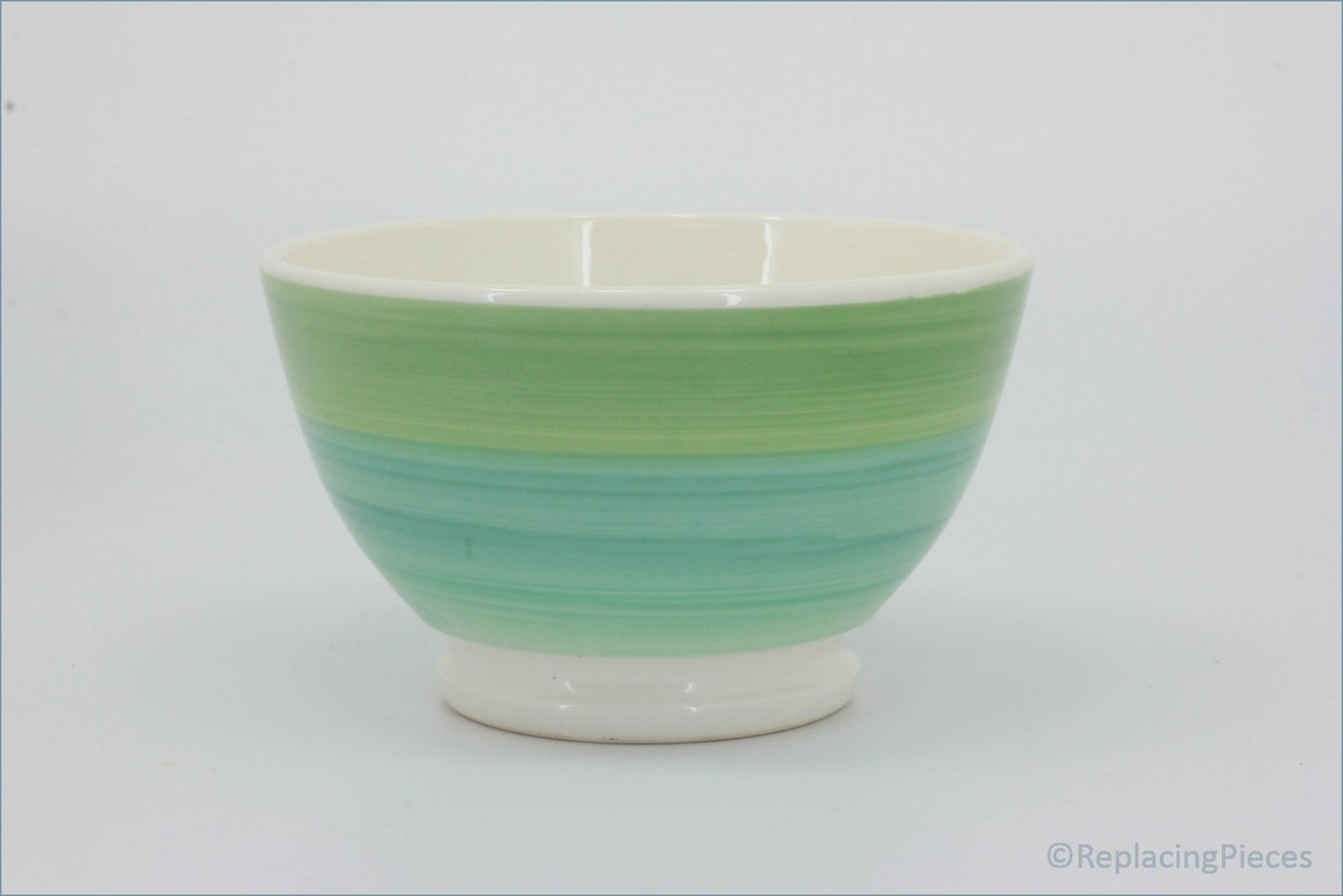 Habitat - Circles - Cereal Bowl  - Green and white ceramic bowl on a white background