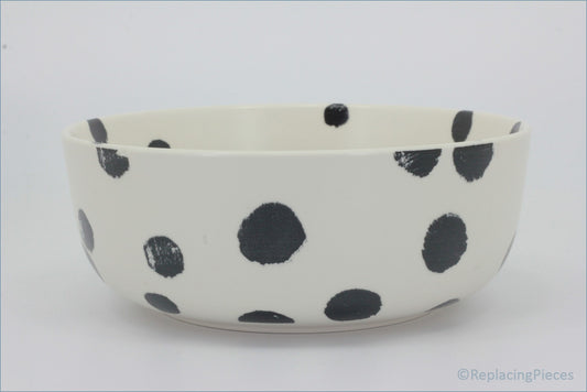 Habitat - Global - Cereal Bowl - White ceramic bowl with black polka dots on a white background