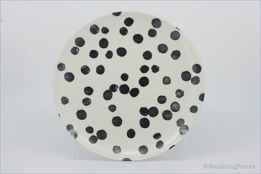 Habitat - Global - Dinner Plate - Round ceramic plate with black polka dots on a white background