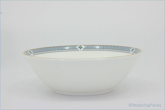 Marks & Spencer - Felsham - Cereal Bowl - White ceramic bowl with decorative blue rim on a light gray background