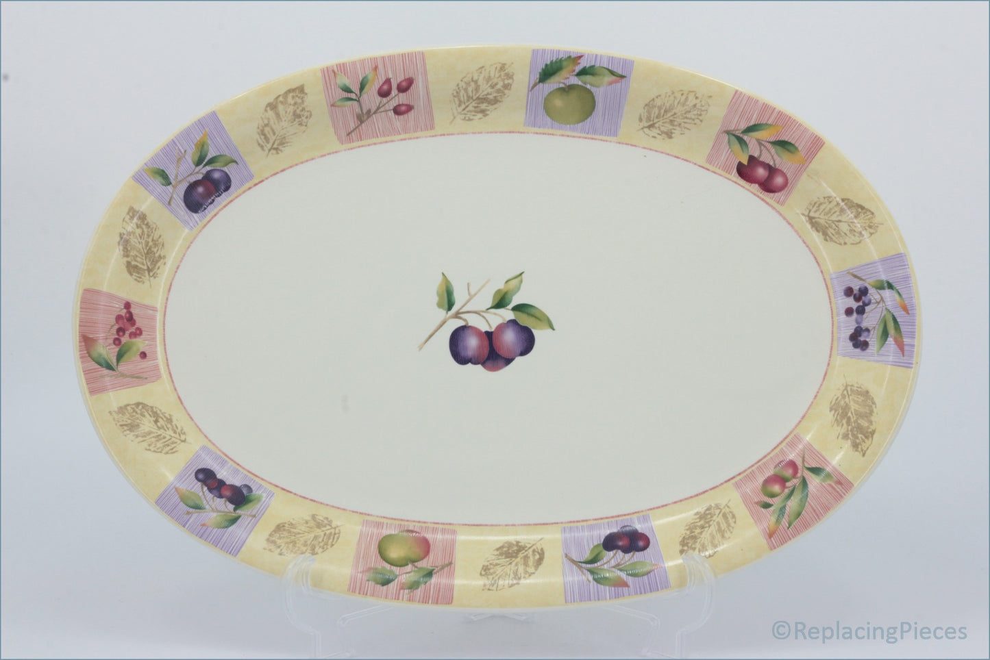 Marks & Spencer - Wild Fruits - 16 1/4" Oval Platter - Decorative oval placemat with fruit design on a white background
