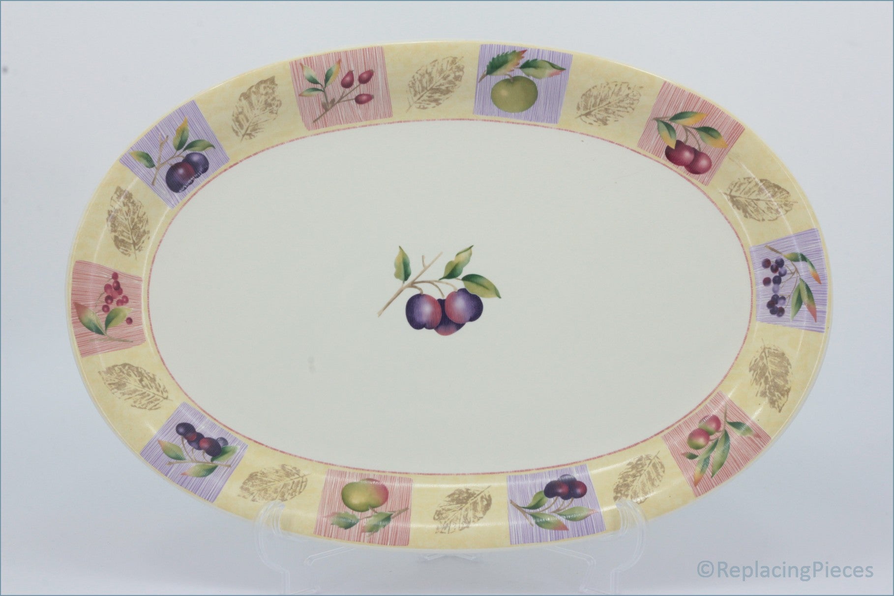 Marks & Spencer - Wild Fruits - 16 1/4" Oval Platter - Decorative oval placemat with fruit design on a white background