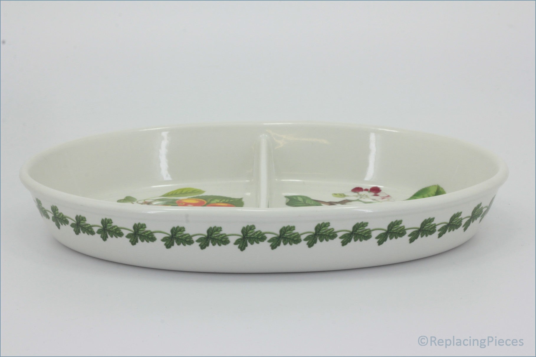 Portmeirion - Pomona - Oval Divided RoasterWhite ceramic platter with floral patterns on a white background- 