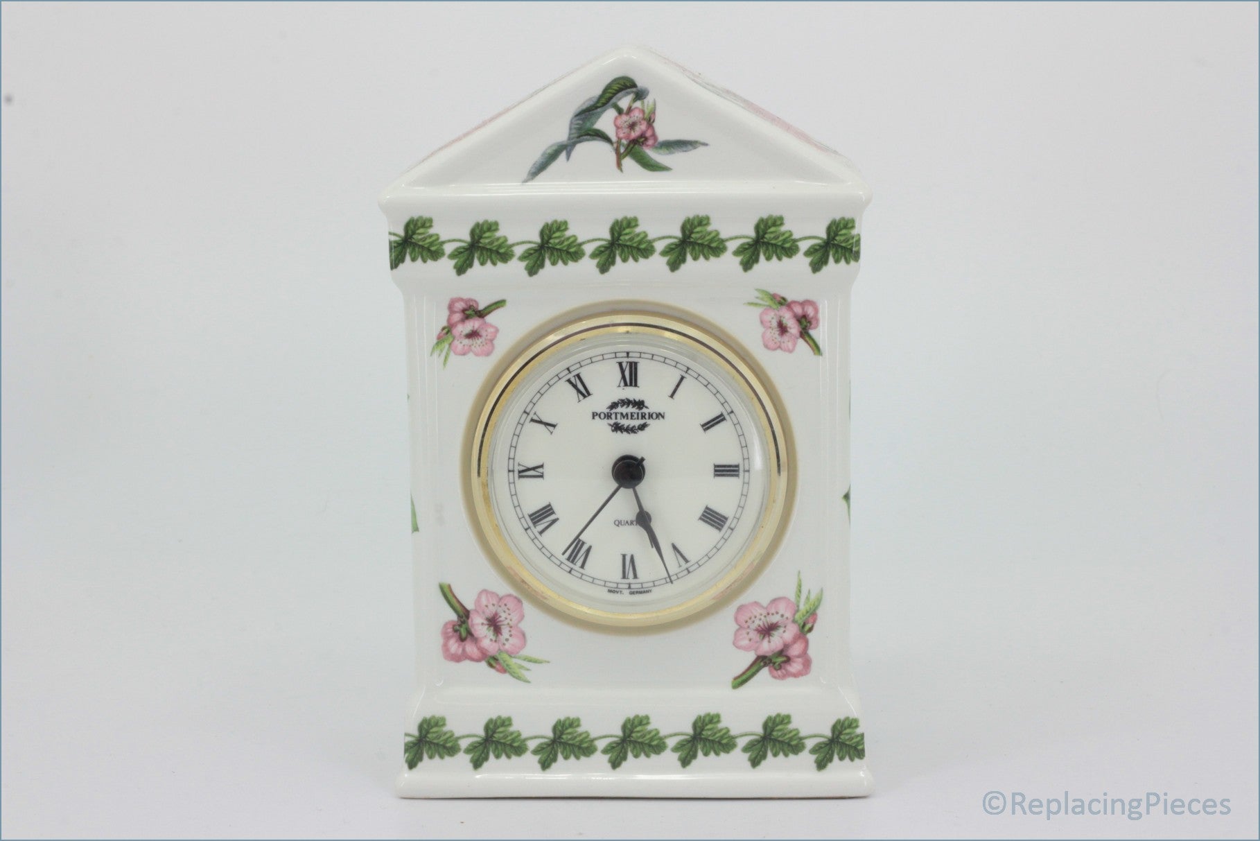 Portmeirion - Pomona - Roman Clock - Decorative clock with floral designs on a white background