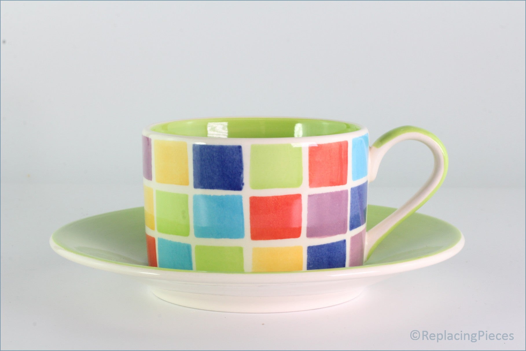 RPW253 - Whittards - Teacup And Saucer (Multi Coloured Squares - Green Interior)