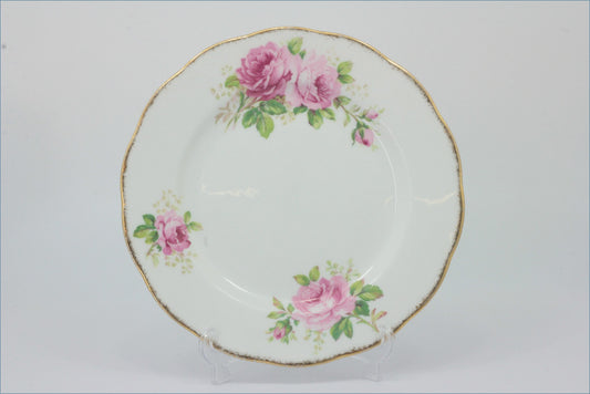 Royal Albert - American Beauty - 8 1/4" Salad Plate - Decorative plate with pink floral design on a white background