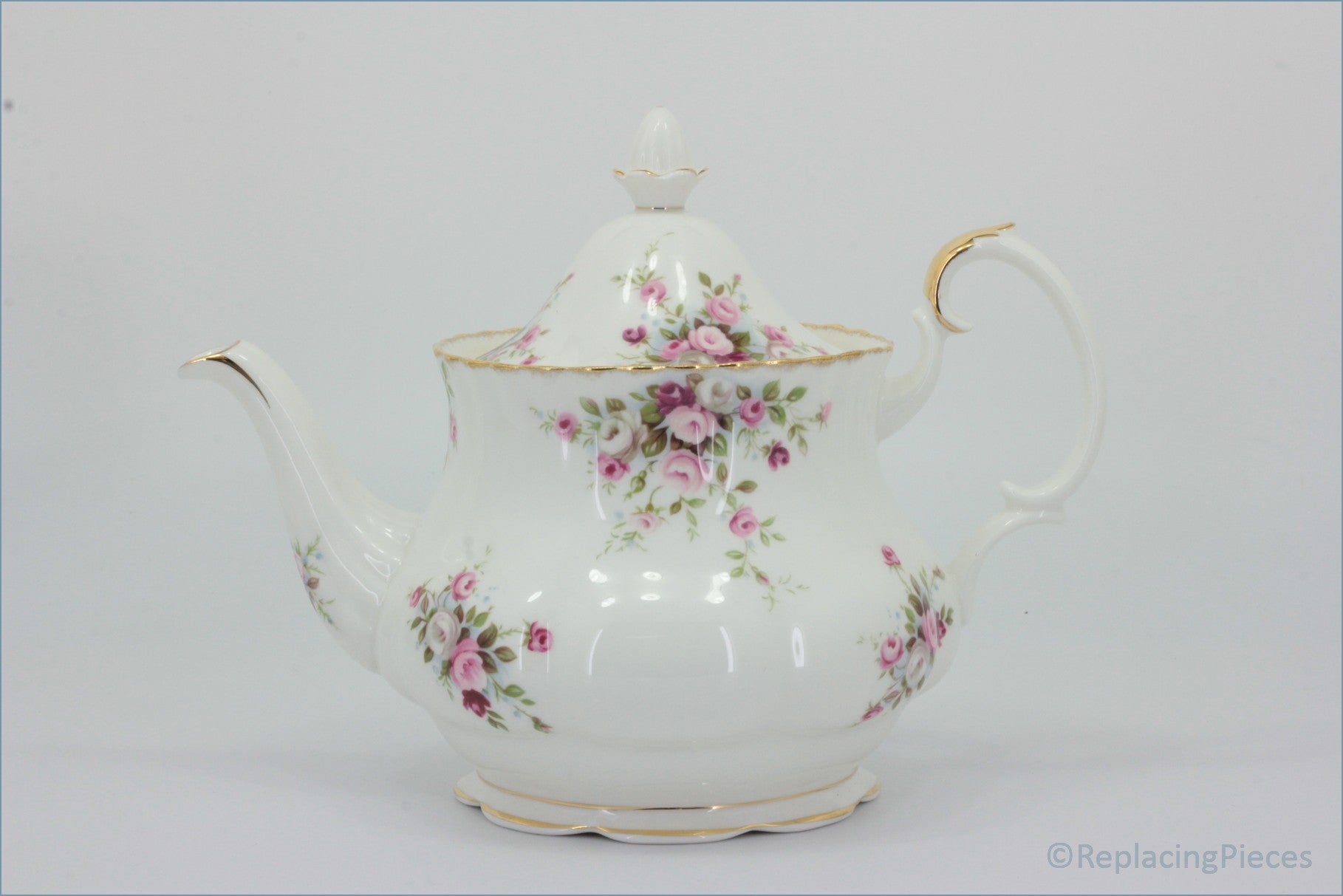 Royal Albert - Cottage Garden - Teapot - White teapot with floral design on a light gray background