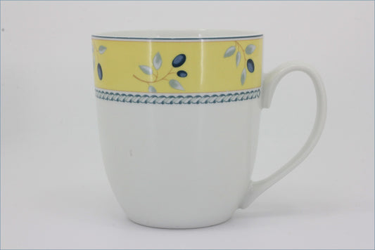 Royal Doulton - Blueberry (Yellow Rim) - Mug - White mug with yellow top section and blue floral design on a white background
