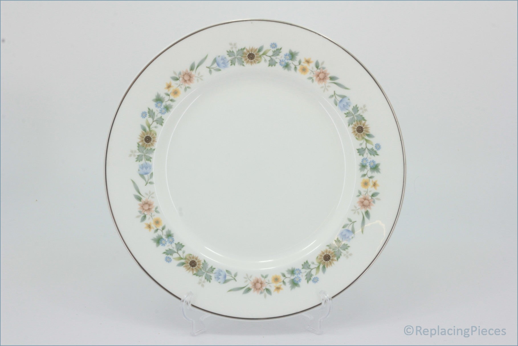 Royal Doulton - Pastorale (H5002) - 9" Luncheon Plate - Decorative plate with floral rim on a white background