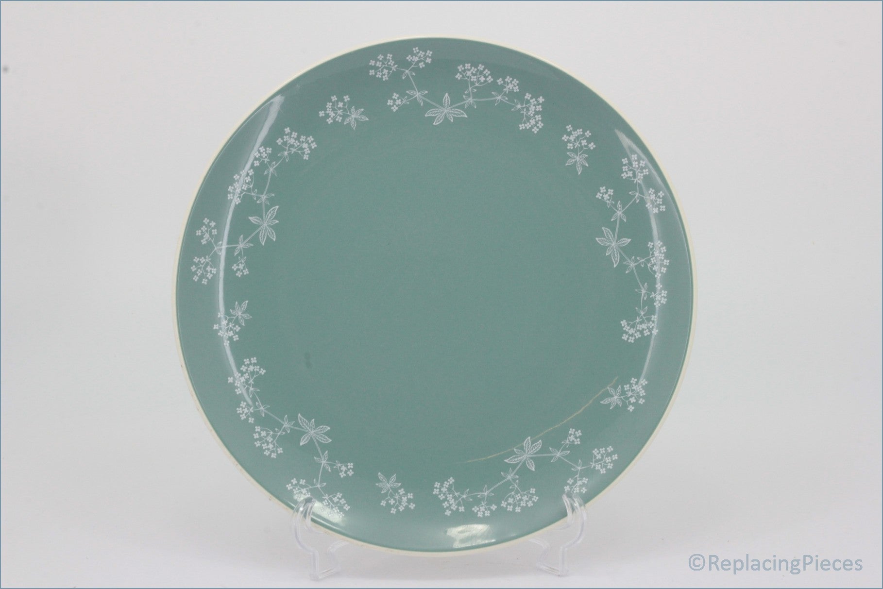 Royal Doulton - Queenslace (D6447) - Dinner Plate - Green ceramic plate with floral patterns on a white background
