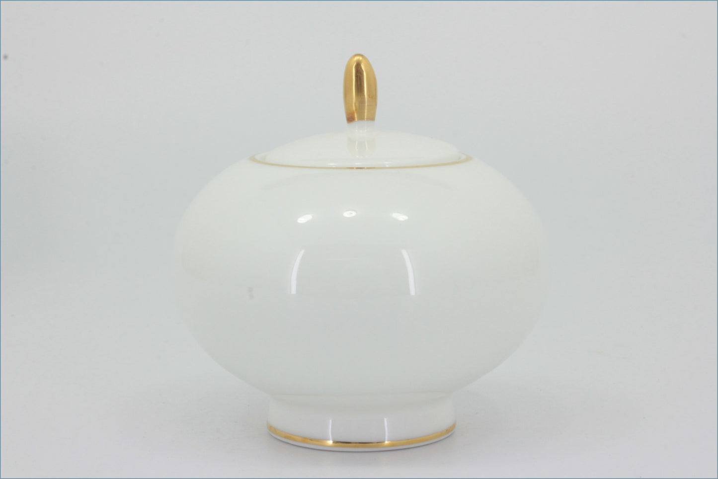 Royal Doulton - Symmetry Gold - Lidded Sugar Bowl - White ceramic jar with gold accents on a white background
