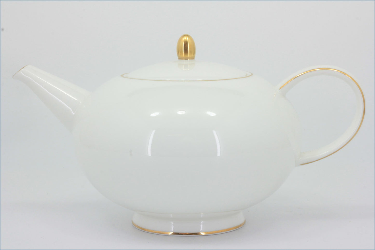 Royal Doulton - Symmetry Gold - Teapot - White teapot with gold accents on a white background 