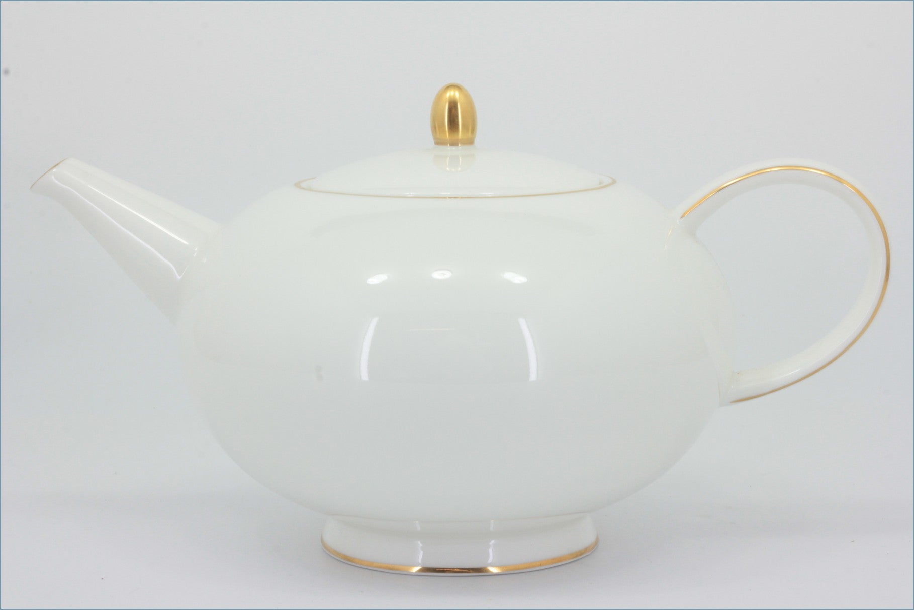 Royal Doulton - Symmetry Gold - Teapot - White teapot with gold accents on a white background 
