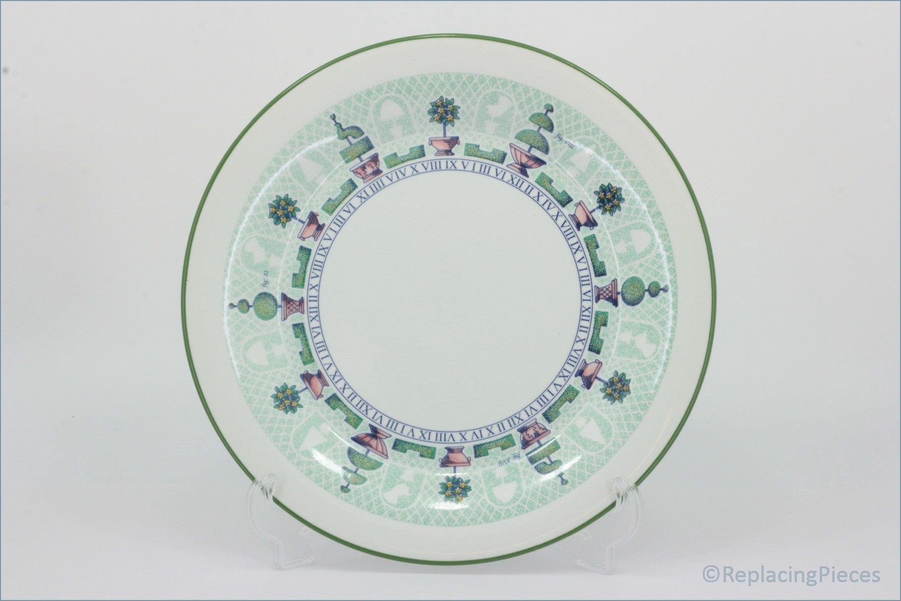 Staffordshire - Topiary - 11 3/4" Round Platter - Decorative plate with a green rim and intricate design on a white background