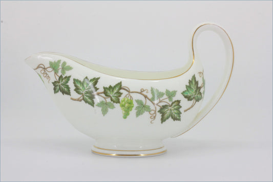 Wedgwood - Santa Clara - Gravy Boat - Decorative ceramic gravy boat with green leaf pattern on a white background