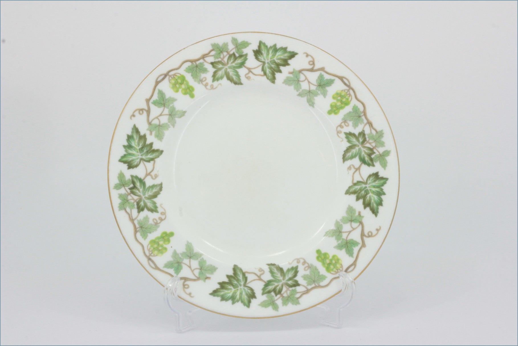 Wedgwood - Santa Clara - 7" Side Plate  - Decorative plate with green leaf pattern on a white background
